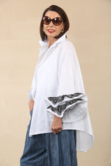 Portofino White Ruffle Sleeve Shirt with black lace on cuff