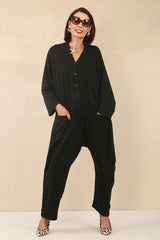 Monica Vneck black jumpsuit