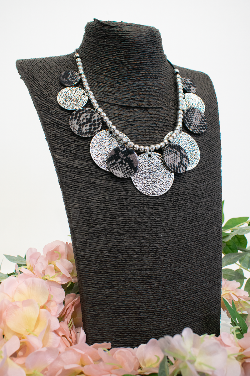 Animal print layered disc necklace in Black