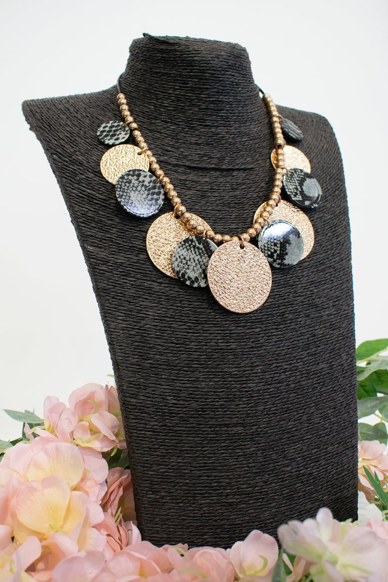 Animal print layered disc necklace in Khaki